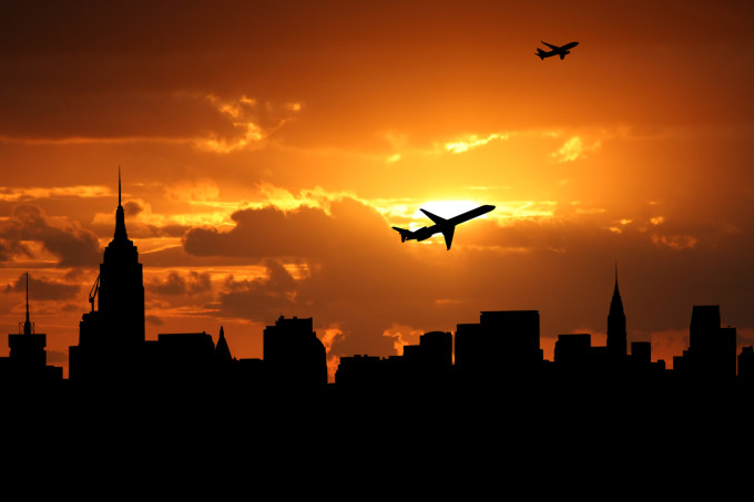 Several planes in the midtown Manhattan skyline