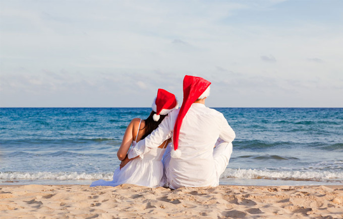 Sitting on a beach during the holidays. 