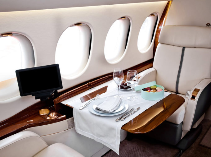 Enjoy a delicious meal on a private jet before landing.