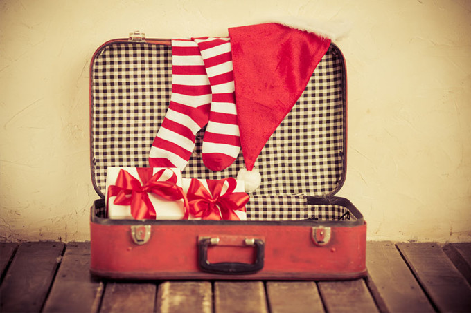 Pack your suitcase with presents and book a private jet charter for the holidays.
