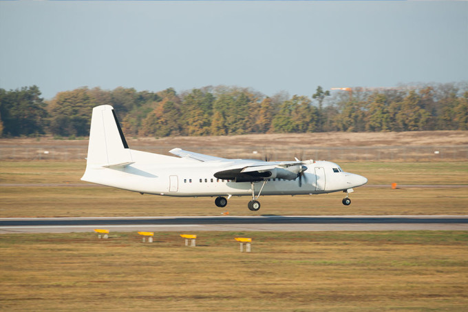 Aircraft landing at a regional airport.