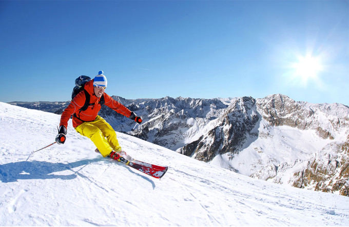 Skier enjoying a perfect day on the slopes.