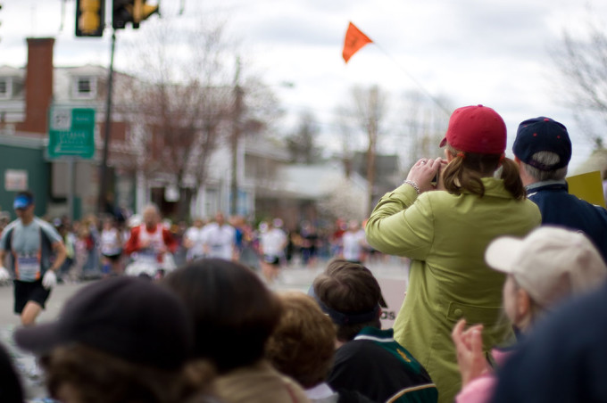 Spectators watching a marathon.