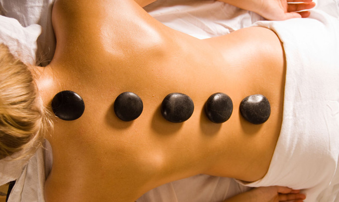 Many fitness retreats offer hot stone therapy.